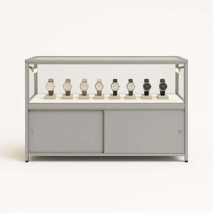 Retail glass counter in silver – lockable cabinet with 4 LEDs and hidden base compartment for secure merchandising